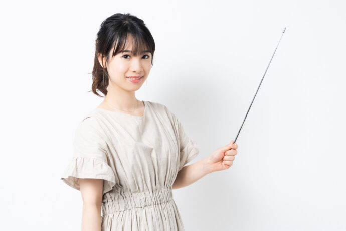 ポイント棒を持つ女性